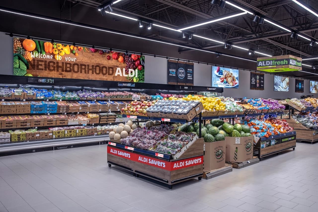 interior of an Aldi's grocery store focusing on the produce section filled with assorted fruits and vegetables