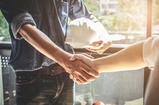 two people shaking hands